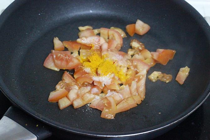 frying tomatoes until mushy to make sorakaya pachadi