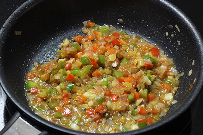 simmering aromatics in sauce