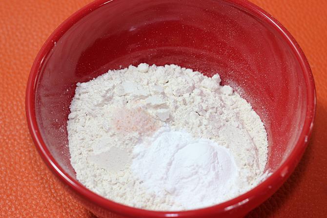 mixing dry ingredients to make eggless banana pancakes recipe