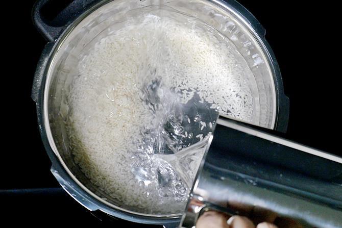 cook rice to make daddojanam