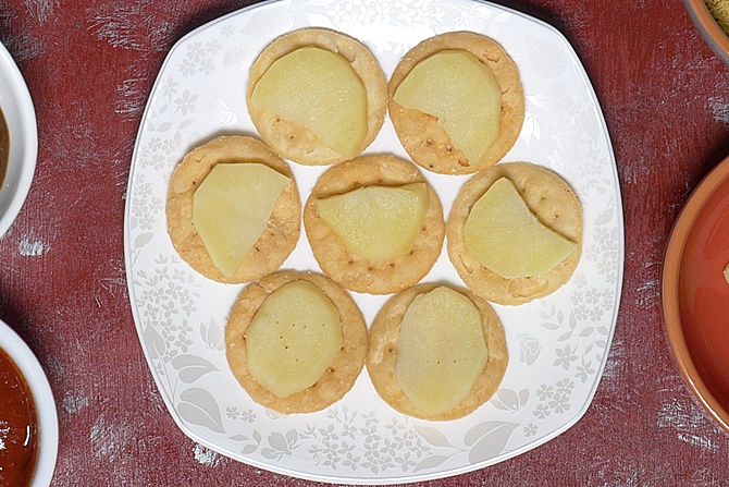 adding sliced potatoes
