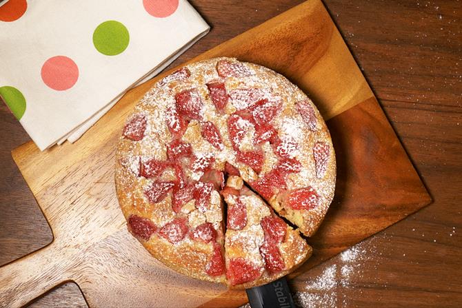 sliced eggless strawberry cake