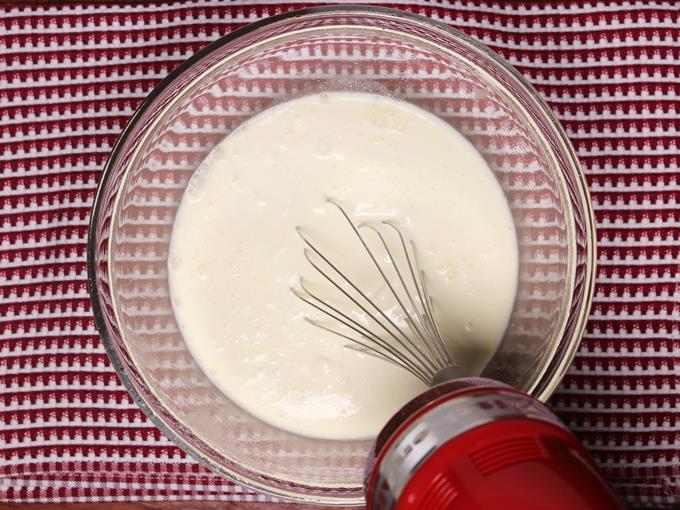 whip whipping cream in a bowl