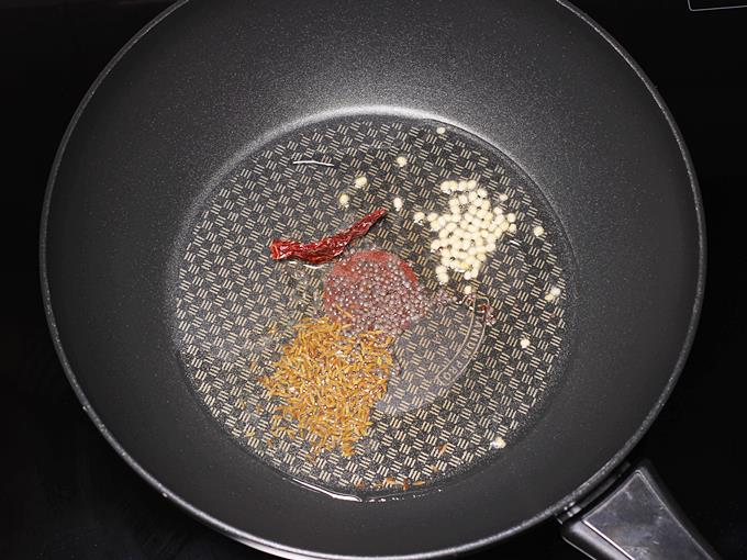 Heat a wide pan