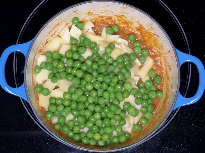 adding peas for aloo matar