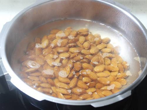 add almonds to hot water