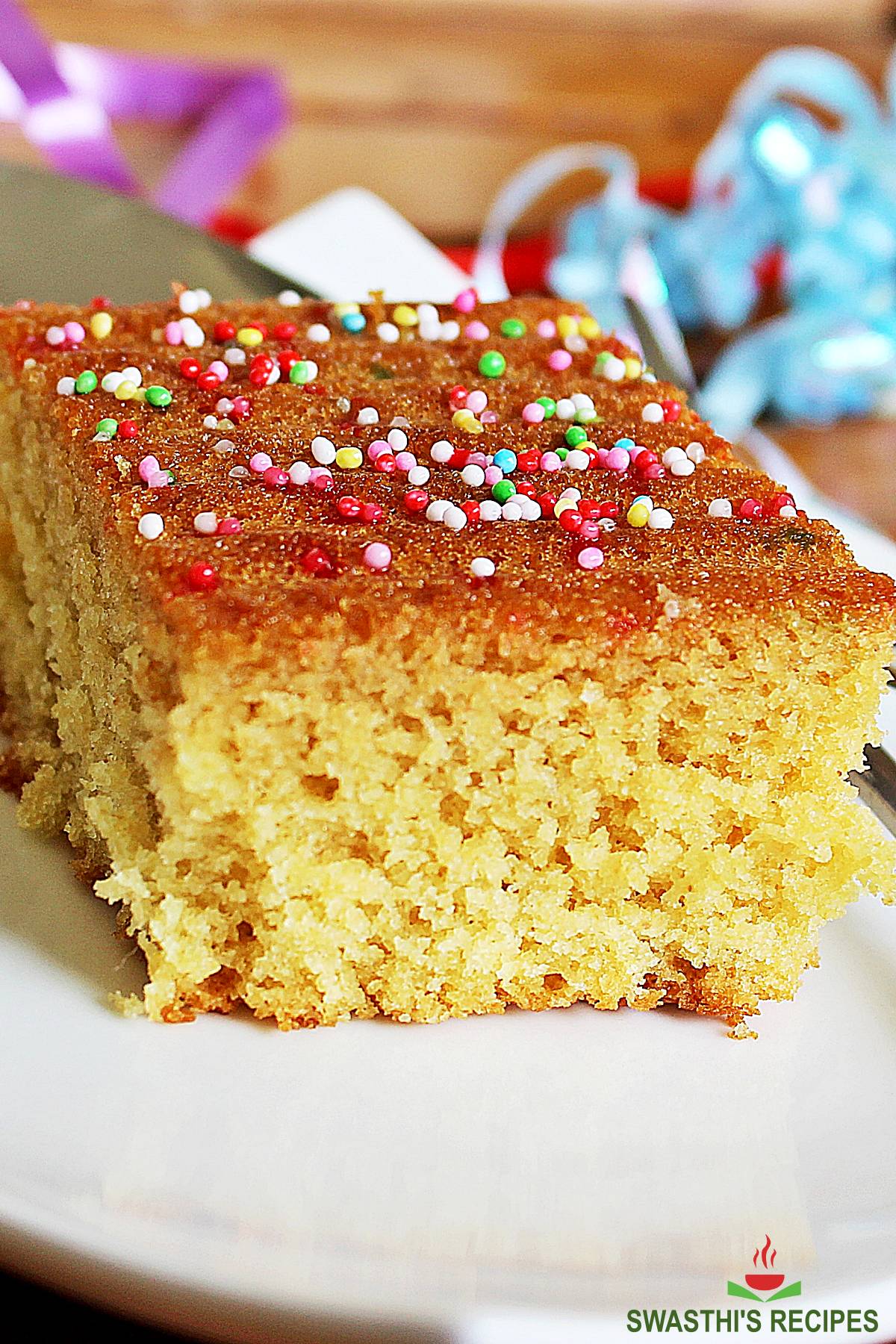 Eggless orange cake made in bakery style