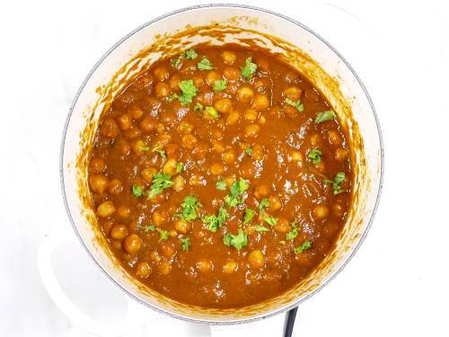 Chana masala ready to be served, garnished with coriander leaves