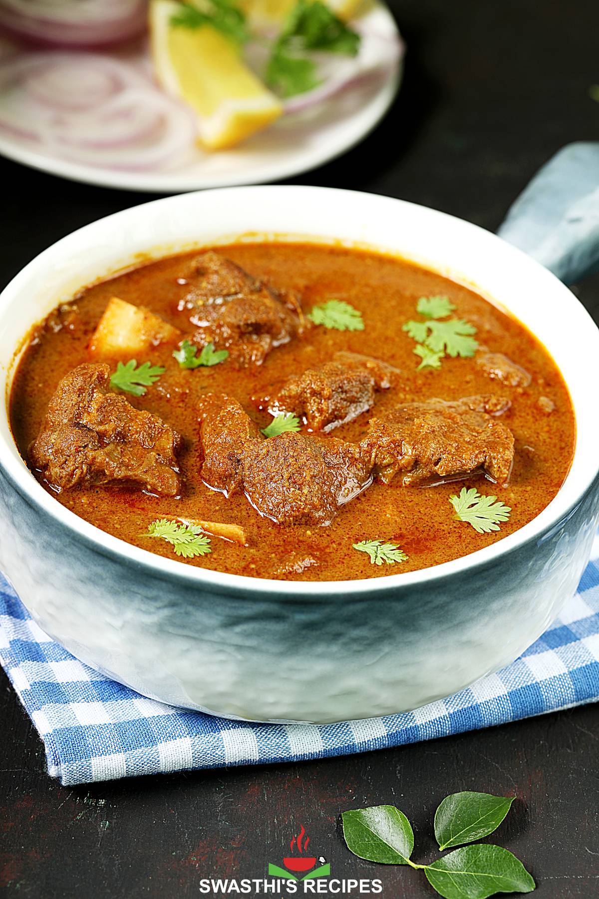 Chettinad Curried Goat in a white bowl