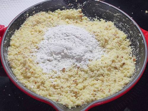 adding powdered sugar